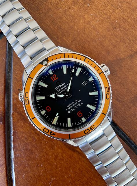 relogio omega seamaster professional planet ocean